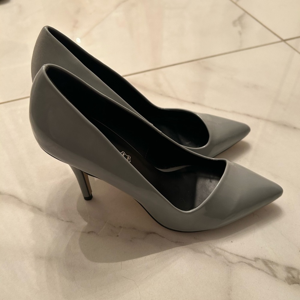 Grey patent leather closed toe heels